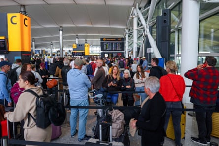 People queueing up to get checked-in at Heathrow