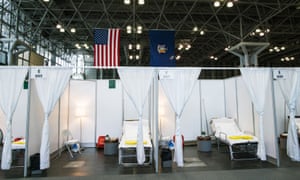Hospital bed booths are set up at the Jacob K. Javits Convention Center in New York City.