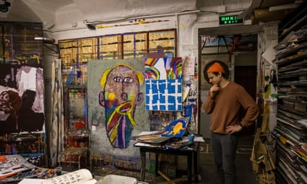 Artist Mykola Kolomiets stands in his studio, where children create artworks, in Kharkiv, Ukraine, on 14 April