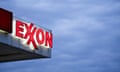 Red Exxon logo against the blue sky