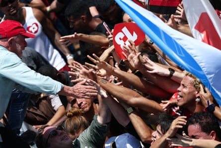 Lula attending a closing campaign rally on Saturday.