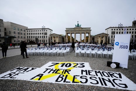 More than 1,000 chairs with photos of those killed in the Hamas attack on southern Israel were set up on Pariser Platz in front of the Brandenburg Gate on 07 October 2025.