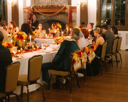 Tables with seated guests at them