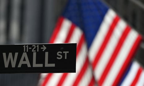 FILES-US-STOCKS-MARKETS-OPEN<br>(FILES) In this file photo taken on February 17, 2021 a Wall Street sign at the New York Stock Exchange (NYSE) is seen in New York, New York. - Wall Street dropped again in early trading November 10, 2021 continuing the retreat begun in the prior session following a record streak, as markets digested a jarring inflation report. (Photo by Angela Weiss / AFP) (Photo by ANGELA WEISS/AFP via Getty Images)