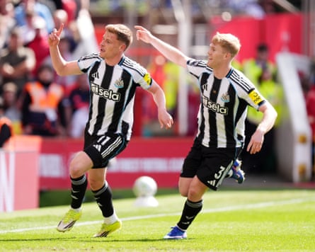 Harvey Barnes (left) celebrates with Lewis Hall after scoring during the Premier League match between Nottingham Forest and Newcastle