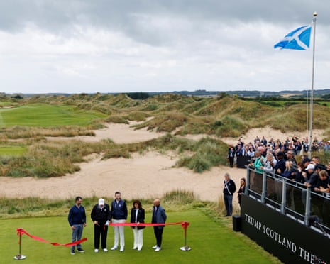 Donald Trump Jr, President Donald Trump, Eric Trump, Trump International Scotland executive vice president Sarah Malone and DP World Tour CEO Guy Kinnings attend the ribbon cutting ceremony during the opening of the Trump International Golf Links.