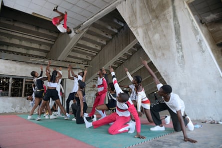 The Lagos Cheer Nigeria cheerleading team practising around the city’s main stadium