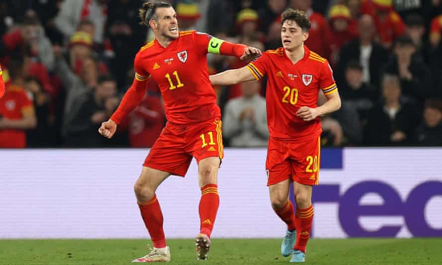 Gareth Bale (left) and Daniel James react to Wales doubling their lead against Austria