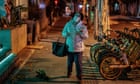 China's cities fall quiet amid warning of three Covid waves over winter