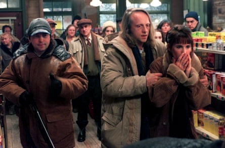 A group of people in a shop.