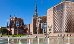 Coventry’s old cathedral shell and new modern cathedral, with Jacob Epstein’s St Michael and the devil sculpture adorning the wall