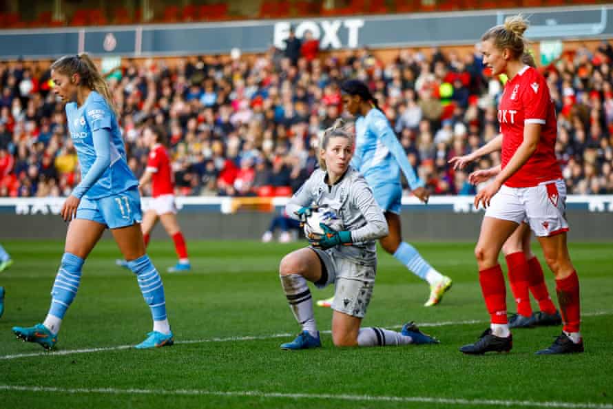 Nottingham Forest’s goalkeeper Emily Batty holds on.