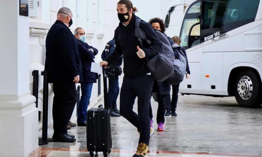 Sergio Ramos and teammates arrive at their hotel in Malaga, having been unable to fly back to the capital.