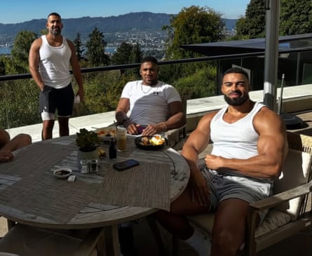 Anthony Joshua with Sina Ghami, left, and Kevin ‘Lateef’ Ayodele, right.