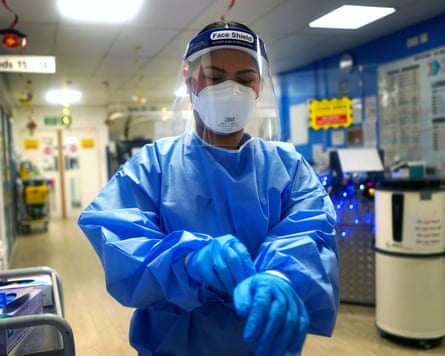 A nurse in full PPE.