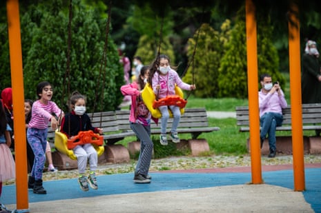 Children play in a park in Istanbul.
