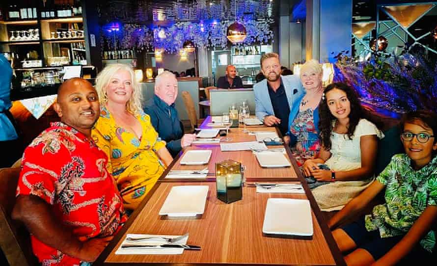 The last family photo taken with John, in June. (Left to right) Jenny’s husband, Amit; Jenny; the twins’ father, Derek; John; their mother, Lyn; and Jenny and Amit’s children, Maya and Seb.