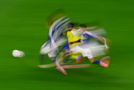 Anthony Elanga of Sweden is challenged by Japan’s Tsuyoshi Watanabe at Dallas Stadium.
