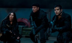 This image released by Lionsgate shows Megan Fox, from left, Andy Garcia, and Jacob Scipio in a scene from "The Expend4bles." (Yana Blajeva/Lionsgate via AP)