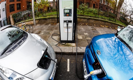 The Nissan Leaf (L) and Kia Soul on charge on a London street
