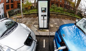 Go Ultra Low Nissan LEAF (L) and Kia Soul EV (R) on charge on a London street.