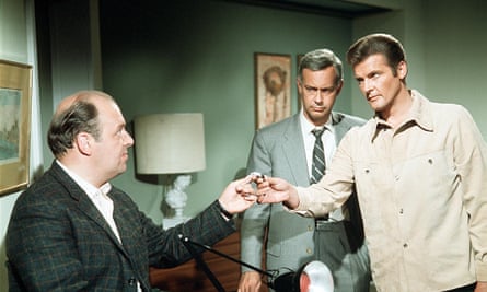 John Savident, left, in ITV’s The Saint, with Roger Moore, right, in 1968.