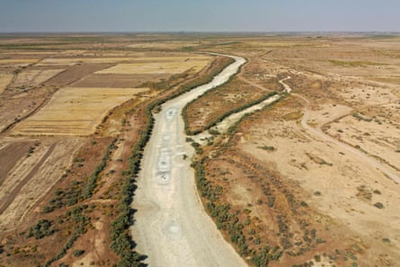 A dry riverbed in an arid landscape