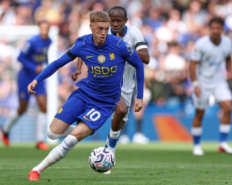Cole Palmer runs with the ball during ChelseaâÂÂs Premier League match against Brighton.