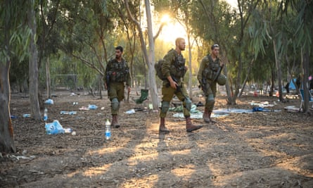 Israeli soldiers at the Supernova site
