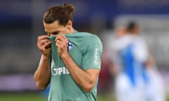 Schalke’s Benjamin Stambouli reacts at full time to the confirmation of relegation