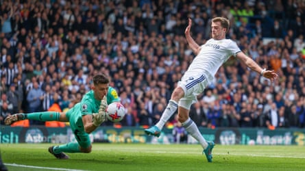 Leeds forward Patrick Bamford misses the penalty and Newcastle United goalkeeper Nick Pope saves the rebound
