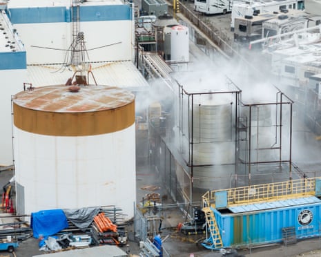Water is sprayed on a damaged tank