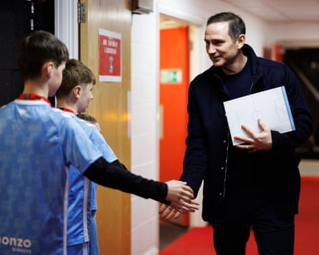 Frank Lampard greets Coventry mascots at the Valley.