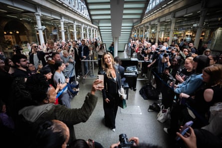 Goodrem takes photos with fans