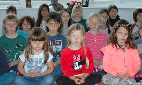 Children at the Buddhist-based Dharma Primary School in Brighton take a class in mindfulness.