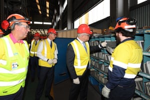 Prime minister Scott Morrison (second right) and minister for energy and emissions reduction Angus Taylor (second left) during a visit to BlueScope Steel in Port Kembla, NSW, today.