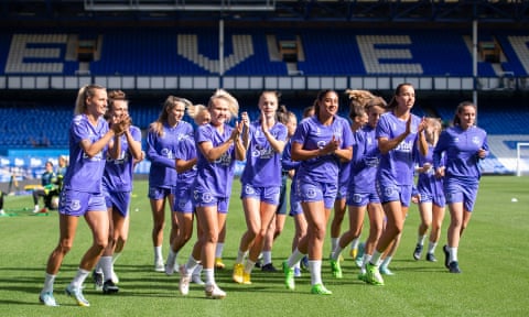 Everton players applaud supporters during an open training session at Goodison Park last month. 