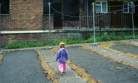 A young girl playing in a council estate in Bristol