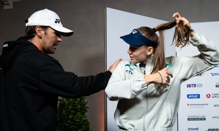 Elena Rybakina of Kazakhstan talks to her coach Stefano Vukov