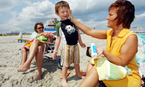 Family applying sunscreen