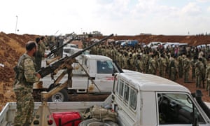 Turkish fighters gather near the north-east Syrian border in preparation of a widely-anticipated invasion.