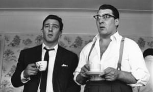London gangsters Ronnie and Reggie Kray refresh themselves with a cup of tea. They had just spent 36 hours being questioned by the police about the murder of George Cornell.  (Photo by William Lovelace/Getty Images)