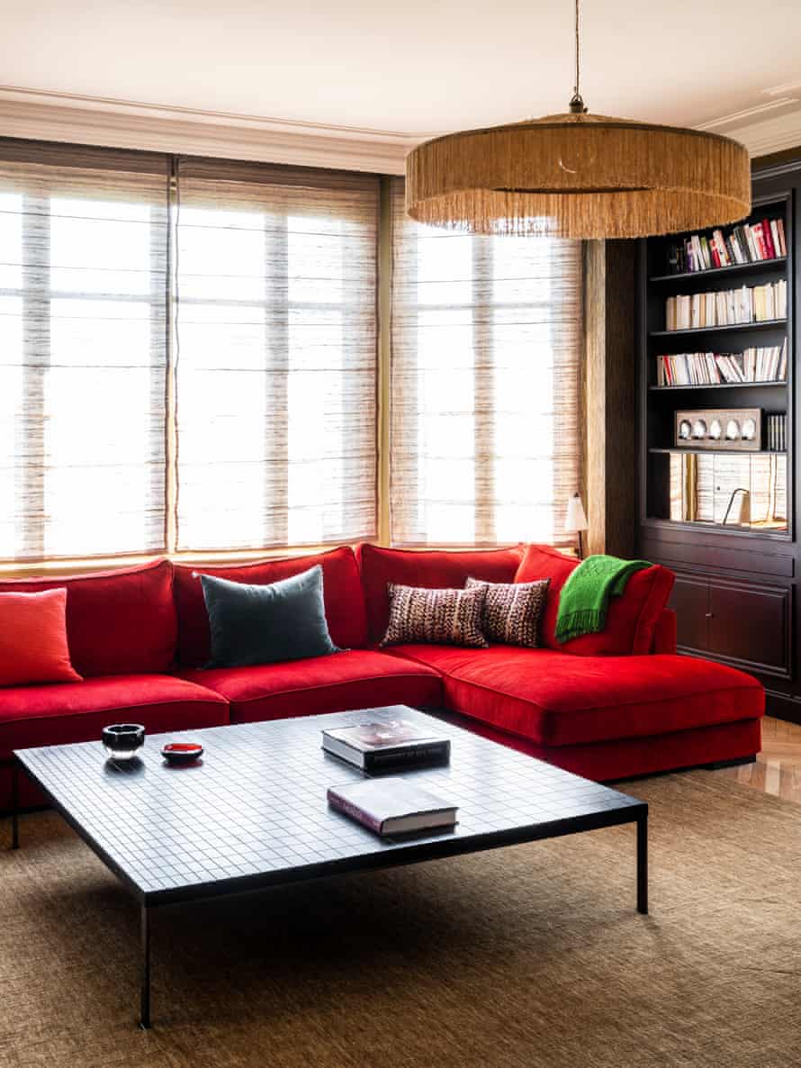 In the red: the striking sitting room.