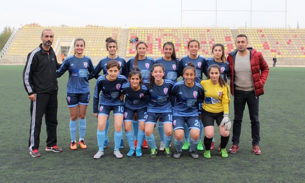 Dogan Deniz Celebi (far right) and Ikranur Sarigul (standing, fourth from right) with the Malatya Women’s Sports Club football team in the world capital of apricots.