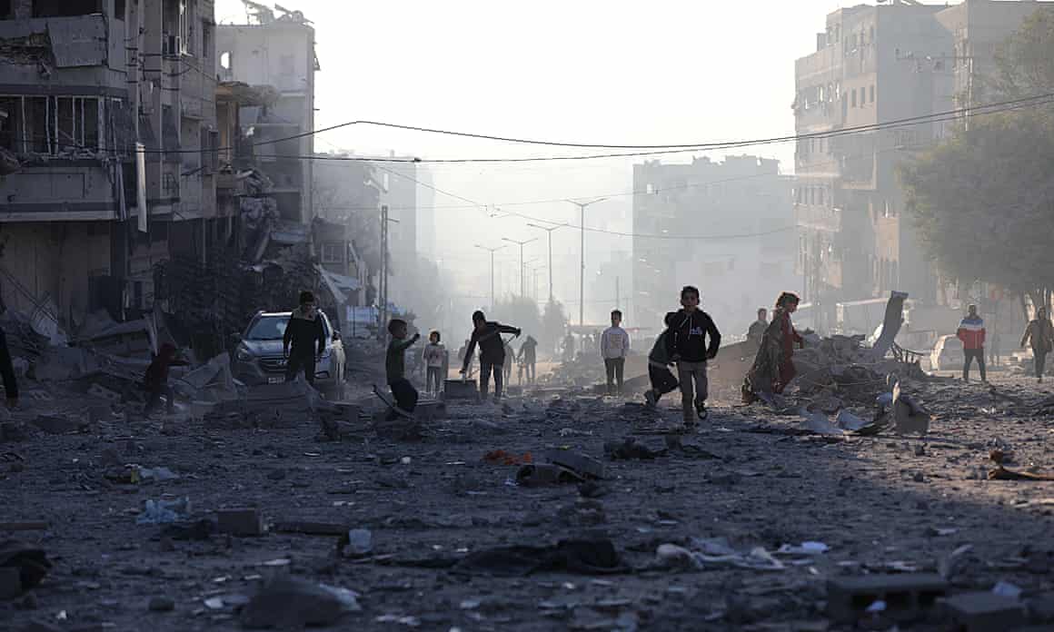 Children in the rubble in Gaza City