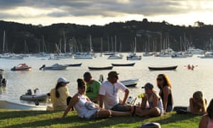 people relaxing at a marina in new zealand