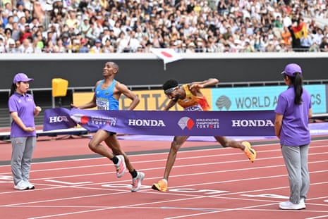Alphonce Felix Simbu (second from left) and Amanal Petros (second from right) cross the finish line during the men’s marathon final at the 2025 World Athletics Championships
