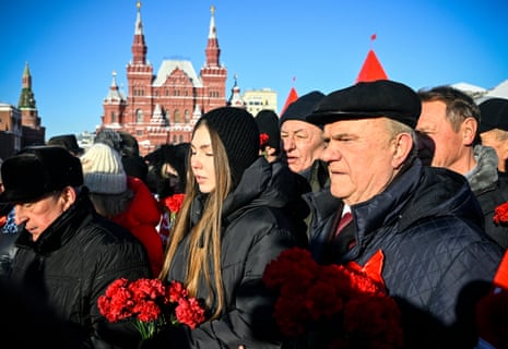 The leader of the Russian Communist party, Gennady Zyuganov (R), attends a flower-laying ceremony in Moscow at the mausoleum of the founder of the Soviet state, Vladimir Lenin, to mark the 100th anniversary of his death.