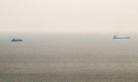 Cargo ships sail through a temporary corridor after leaving the Ukranian port of Odesa on Friday