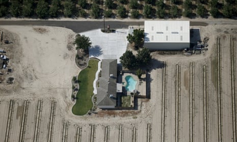 A farm with a swimming pool near Fresno, California, in 2015. For some in rural communities, the last drought never really ended.